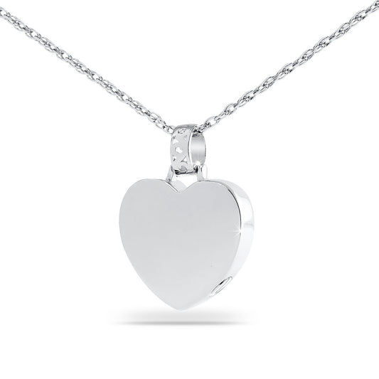 Polished silver heart pendant about one inch tall hanging on a fine chain