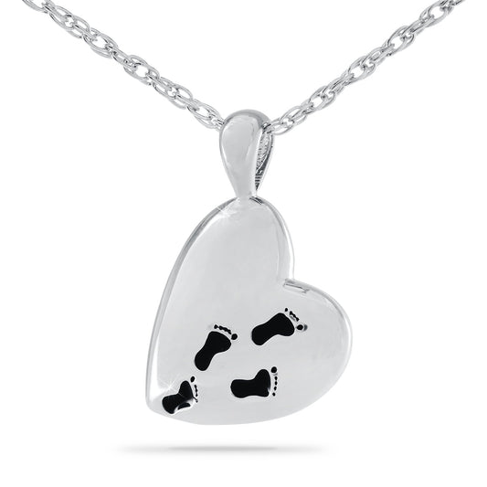 Wide stainless steel pendant engraved with lines from the Footprints prayer and two footprints