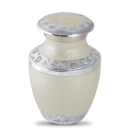 White aluminum keepsake urn with a raised painted floral band around the middle