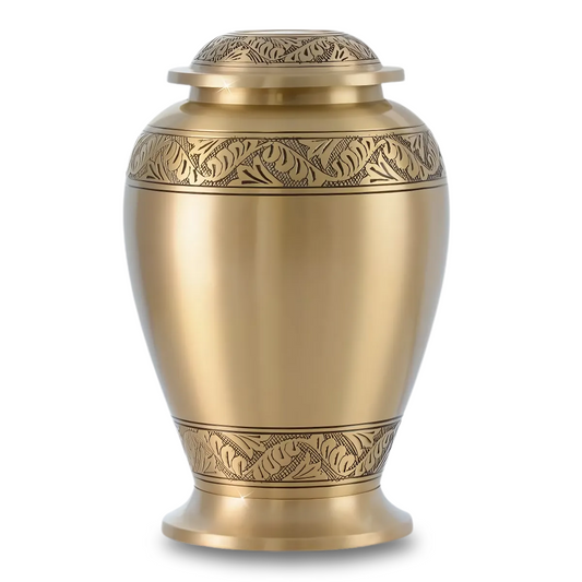 Polished brass cremation urn with long feather shapes worked across the body