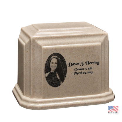Wide stone cremation urn with a low rectangular body and rounded shoulders