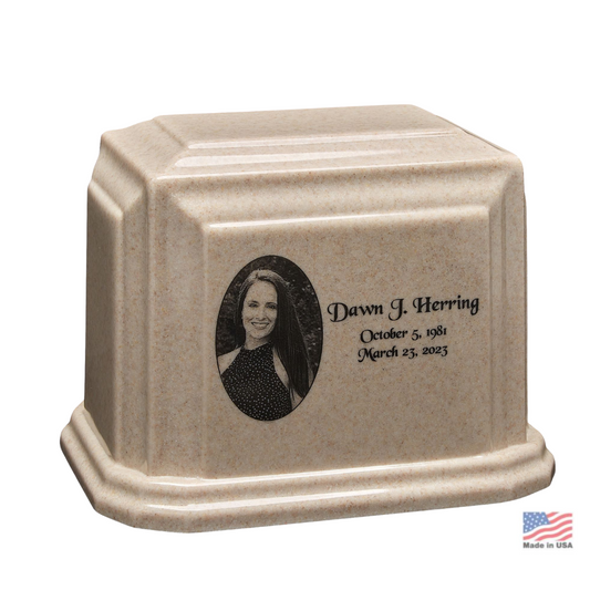 Wide stone cremation urn with a low rectangular body and rounded shoulders