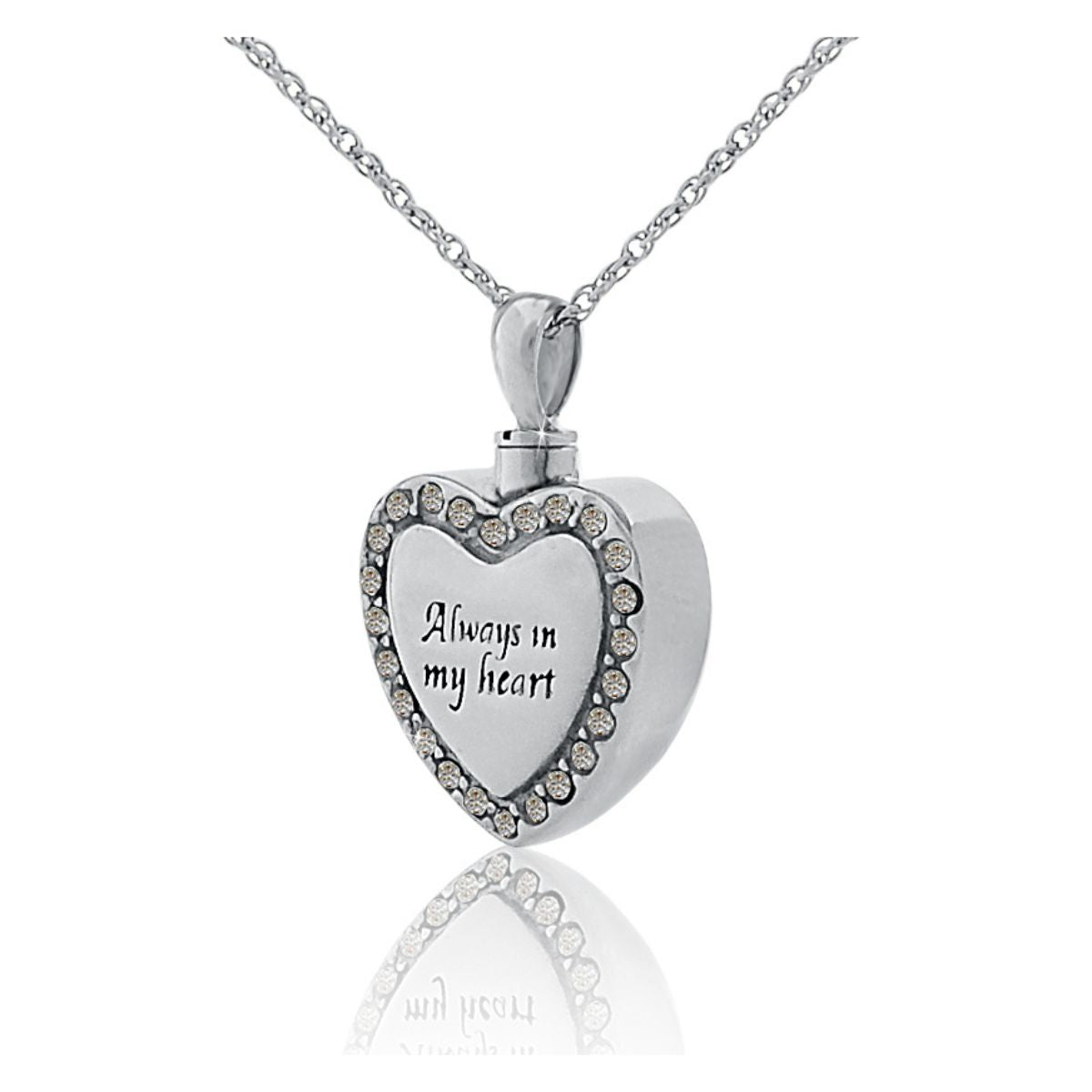 Silver heart pendant set with small white stones, hanging from a silver chain