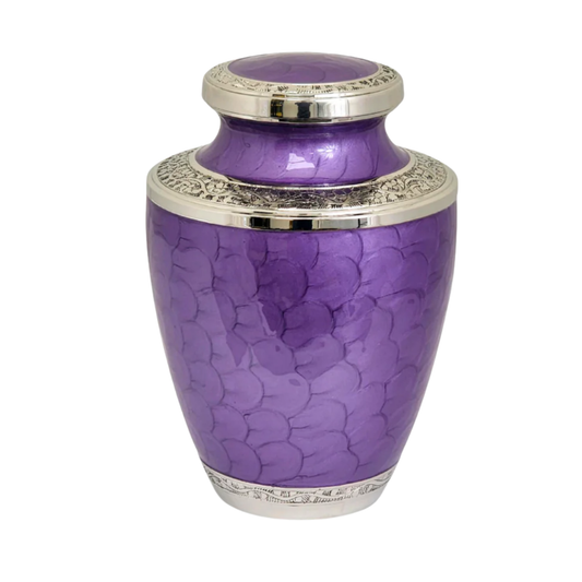 Brass cremation urn with a purple floral band around the body and a domed lid