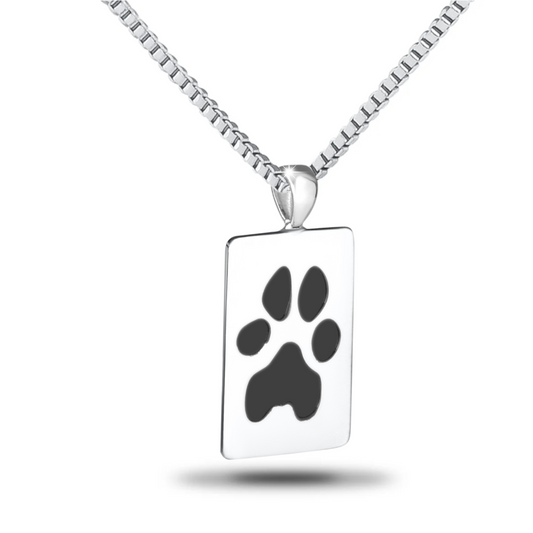 Rectangular steel dog tag with rounded corners and an engraved paw print