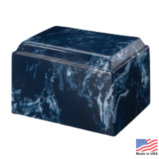 Wide cast stone cremation urn in a deep navy matte finish with no surface decoration