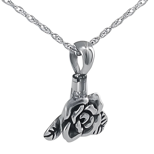 Stainless steel rose pendant with tightly folded petals, hanging from a chain